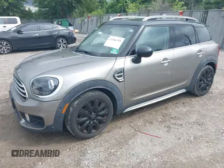 2018 MINI Countryman Cooper z VIN WMZYV5C39J3E02982, wystawiony jako IAAI lot #42384795 z przebiegiem 74 599 mil mil oraz . Historia ofert i sprzedaży dostępna na DreamBid. Obrazek 17.