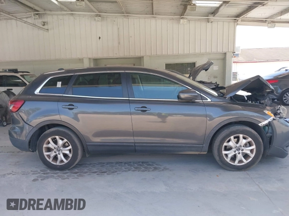 2014 Mazda CX-9 Touring with VIN JM3TB2CA9E0443012, listed as a IAAI auction lot 42159985 with 156,352 mi miles and . Bid and sale history available at DreamBid. Image 13.