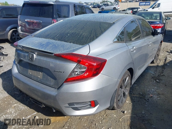 2019 Honda Civic Sport with VIN 19XFC2F88KE034868, listed as a IAAI auction lot 41913004 with 60,599 mi miles and . Bid and sale history available at DreamBid. Image 4.