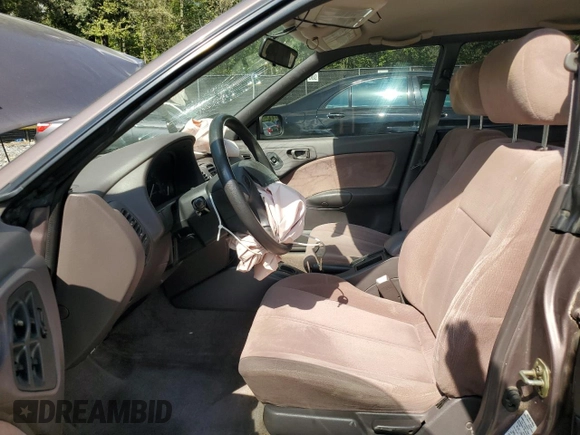 1995 Subaru Legacy L with VIN 4S3BK6353S7328522, listed as a Copart auction lot 71933944 with 60,105 mi miles and Salvage title. Bid and sale history available at DreamBid. Image 7.