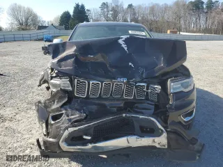 2017 Jeep Grand Cherokee Overland with VIN 1C4RJECG2HC712823, listed as a Copart auction lot 48063325 with 124,812 mi miles and Salvage Title. Bid and sale history available at carsss.com. Image 5.