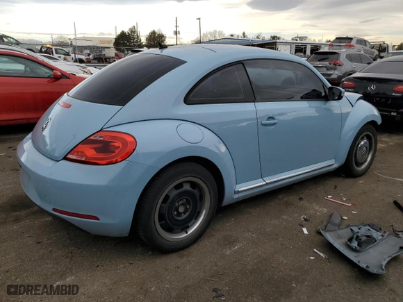 2012 Volkswagen Beetle 2.5L w/Sun/Sound/Nav PZEV with VIN 3VWJP7AT9CM618529, listed as a Copart auction lot 84940494 with 102,838 mi miles and Salvage Title. Bid and sale history available at carsss.com. Image 3.
