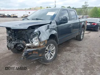 2018 Ford F-150 XL with VIN 1FTEW1CP2JFB50192, listed as a IAAI auction lot 41946675 with 154,934 mi miles. Bid and sale history available at carsss.com. Image 2.