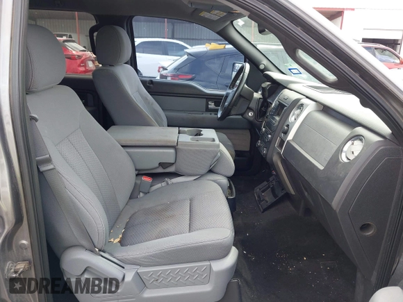 2013 Ford F-150 XL with VIN 1FTFW1CTXDFA78857, listed as a IAAI auction lot 42416880 with 215,031 mi miles and . Bid and sale history available at DreamBid. Image 5.
