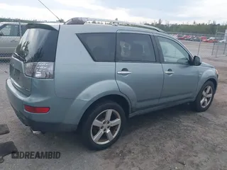 2007 Mitsubishi Outlander XLS z VIN JA4MS41X57Z016273, wystawiony jako IAAI lot #38897236 z przebiegiem 165 376 mil mil oraz . Historia ofert i sprzedaży dostępna na DreamBid. Obrazek 4.