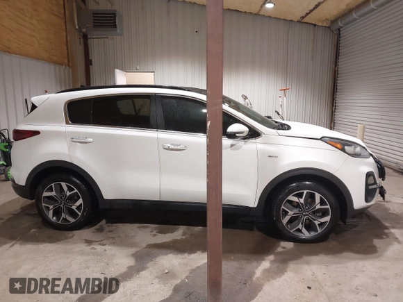 2020 Kia Sportage EX z VIN KNDPNCAC4L7802413, wystawiony jako IAAI lot #41921265 z przebiegiem 92 100 mil mil oraz . Historia ofert i sprzedaży dostępna na DreamBid. Obrazek 14.