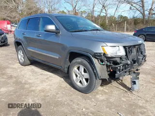 2013 Jeep Grand Cherokee Laredo with VIN 1C4RJEAG0DC616413, listed as a IAAI auction lot 41345278 with 157,875 mi miles. Bid and sale history available at carsss.com. Image 1.
