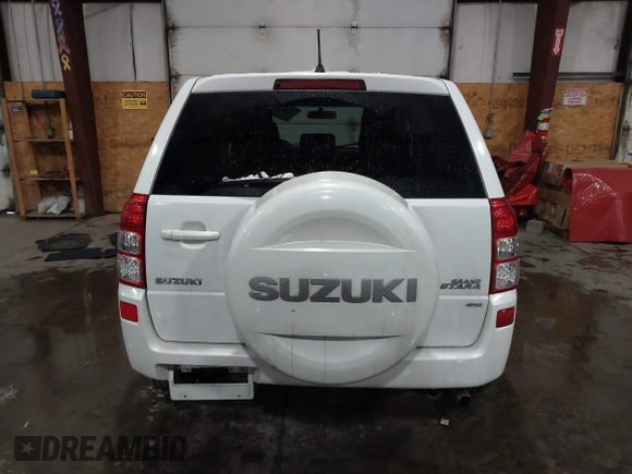 2011 Suzuki Grand Vitara Premium z VIN JS3TD0D24B4101861, wystawiony jako IAAI lot #41620401 z przebiegiem 151 034 mil mil oraz . Historia ofert i sprzedaży dostępna na DreamBid. Obrazek 16.