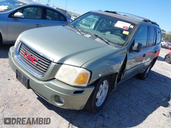 2003 GMC Envoy SLT with VIN 1GKDS13S432373988, listed as a IAAI auction lot 41840744 with 221,306 mi miles. Bid and sale history available at carsss.com. Image 17.