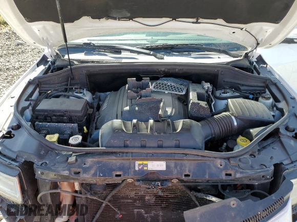 2014 Jeep Grand Cherokee Summit with VIN 1C4RJFJTXEC134150, listed as a Copart auction lot 61859265 with 159,262 mi miles and Salvage title. Bid and sale history available at DreamBid. Image 12.