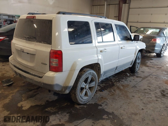 2014 Jeep Patriot Latitude with VIN 1C4NJRFB4ED864114, listed as a IAAI auction lot 41639732 with 103,119 mi miles. Bid and sale history available at carsss.com. Image 4.