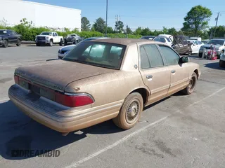 1996 Mercury Grand Marquis GS with VIN 2MELM74W3TX670994, listed as a IAAI auction lot 42052604 with 46,728 mi miles and . Bid and sale history available at DreamBid. Image 4.