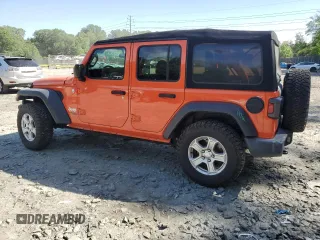 2019 Jeep Wrangler Unlimited Sport S with VIN 1C4HJXDG2KW516005, listed as a Copart auction lot 57330645 with 59,706 mi miles and Salvage title. Bid and sale history available at DreamBid. Image 2.