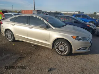 2017 Ford Fusion Titanium z VIN 3FA6P0SU5HR373140, wystawiony jako IAAI lot #41082406 z przebiegiem 98 422 mil mil oraz . Historia ofert i sprzedaży dostępna na DreamBid. Obrazek 1.