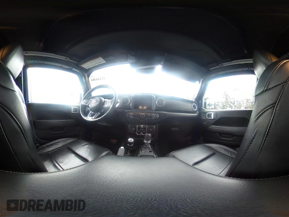 2019 Jeep Wrangler Unlimited Sahara with VIN 1C4HJXEG2KW609315, listed as a IAAI auction lot 41144404 with 55,266 mi miles and . Bid and sale history available at DreamBid. Image 19.