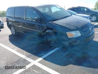 2009 Dodge Grand Caravan SE z VIN 2D8HN44EX9R623373, wystawiony jako IAAI lot #41967398 z przebiegiem 225 611 mil mil oraz . Historia ofert i sprzedaży dostępna na DreamBid. Obrazek 1.