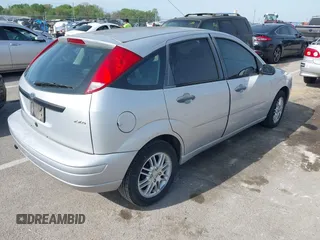 2006 Ford Focus S z VIN 1FAHP37N46W190690, wystawiony jako IAAI lot #42104962 z przebiegiem 159 875 mil mil oraz . Historia ofert i sprzedaży dostępna na DreamBid. Obrazek 4.