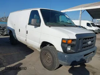 2014 Ford Econoline Cargo Commercial with VIN 1FTNE1EW4EDA92742, listed as a IAAI auction lot 41702320 with 207,179 mi miles and . Bid and sale history available at DreamBid. Image 1.