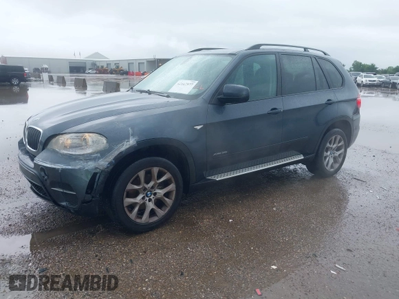 2011 BMW X5 35i z VIN 5UXZV4C59BL404339, wystawiony jako IAAI lot #42167977 z przebiegiem 109 378 mil mil oraz . Historia ofert i sprzedaży dostępna na DreamBid. Obrazek 2.