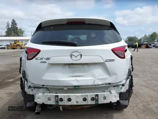 2015 Mazda CX-5 Touring with VIN JM3KE4CY4F0488484, listed as a IAAI auction lot 42115093 with 156,344 mi miles. Bid and sale history available at carsss.com. Image 17.