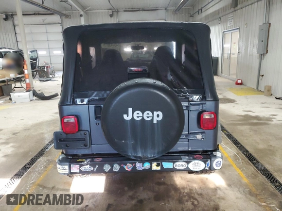 2001 Jeep Wrangler SE with VIN 1J4FA29P31P357744, listed as a Copart auction lot 45743275 with 188,045 mi miles and Salvage Title. Bid and sale history available at carsss.com. Image 6.