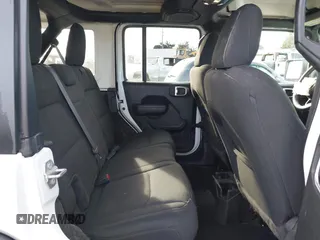 2023 Jeep Wrangler Sport with VIN 1C4HJXDG4PW567027, listed as a IAAI auction lot 41633197 with 14,782 mi miles and . Bid and sale history available at DreamBid. Image 8.