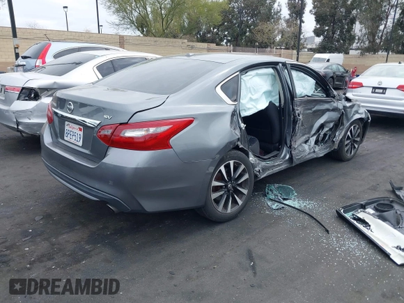 2018 Nissan Altima SV with VIN 1N4AL3AP3JC255885, listed as a IAAI auction lot 42033198 with 134,998 mi miles and . Bid and sale history available at DreamBid. Image 4.