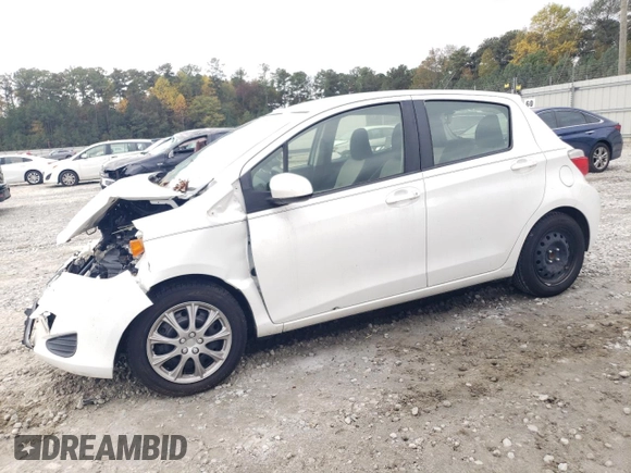 2012 Toyota Yaris L with VIN JTDKTUD30CD528470, listed as a Copart auction lot 79952414 with 157,062 mi miles and Salvage Title. Bid and sale history available at DreamBid. Image 1.
