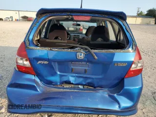 2007 Honda Fit Sport with VIN JHMGD37657S061775, listed as a Copart auction lot 69941734 with 213,944 mi miles and Salvage Title. Bid and sale history available at carsss.com. Image 6.