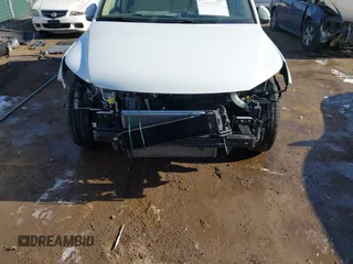 2016 Volkswagen Tiguan SE with VIN WVGBV7AX0GW018760, listed as a IAAI auction lot 41733586 with 60,743 mi miles and . Bid and sale history available at DreamBid. Image 6.