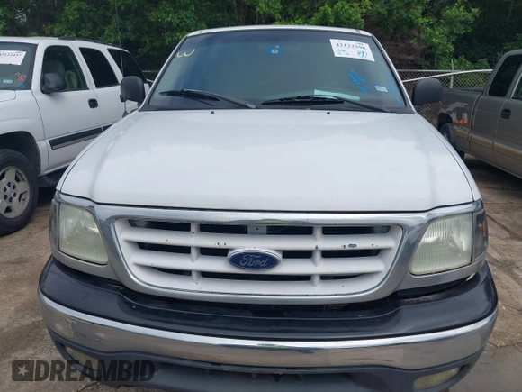 2002 Ford F-150 XL with VIN 1FTRX17202NA10047, listed as a IAAI auction lot 42122396 with 1 mi miles. Bid and sale history available at carsss.com. Image 6.