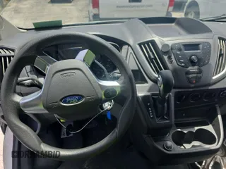 2018 Ford Transit with VIN 1FTYR1ZMXJKB47999, listed as a IAAI auction lot 42787302 with 140,957 mi miles and . Bid and sale history available at DreamBid. Image 10.