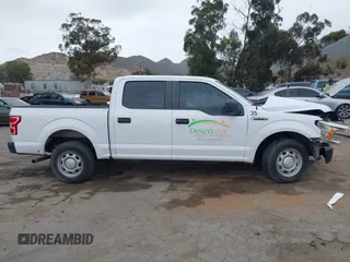 2019 Ford F-150 XL with VIN 1FTEW1CB3KKE51647, listed as a IAAI auction lot 42022111 with 59,344 mi miles and . Bid and sale history available at DreamBid. Image 13.
