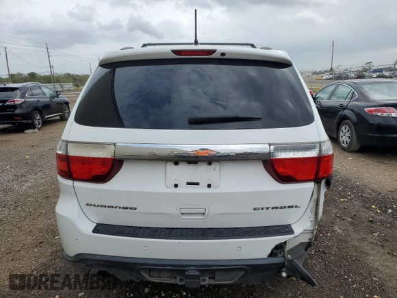 2013 Dodge Durango Citadel with VIN 1C4SDHET2DC613983, listed as a Copart auction lot 80585254 with 164,580 mi miles and Salvage Title. Bid and sale history available at carsss.com. Image 6.