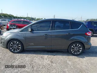 2017 Ford C-Max Energi Titanium with VIN 1FADP5FU9HL117693, listed as a IAAI auction lot 42059763 with 86,827 mi miles. Bid and sale history available at carsss.com. Image 15.