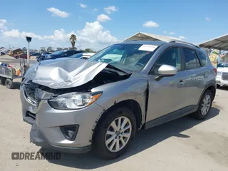 2014 Mazda CX-5 Touring z VIN JM3KE2CYXE0322943, wystawiony jako IAAI lot #41934670 z przebiegiem 110 690 mil mil oraz . Historia ofert i sprzedaży dostępna na DreamBid. Obrazek 17.