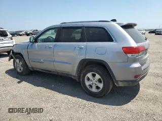 2017 Jeep Grand Cherokee Laredo with VIN 1C4RJEAG0HC816410, listed as a Copart auction lot 52909905 with 102,326 mi miles and Salvage title. Bid and sale history available at DreamBid. Image 2.