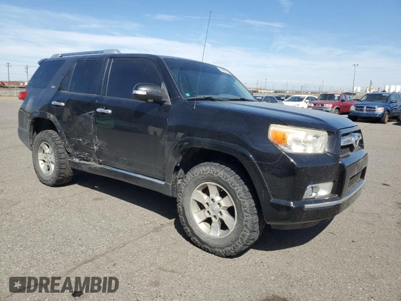 2011 Toyota 4Runner Trail with VIN JTEBU5JR7B5039144, listed as a Copart auction lot 55885955 with 182,980 mi miles and Salvage title. Bid and sale history available at DreamBid. Image 4.