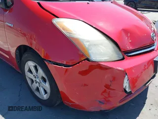 2007 Toyota Prius z VIN JTDKB20U373288946, wystawiony jako IAAI lot #42385536 z przebiegiem 133 336 mil mil oraz . Historia ofert i sprzedaży dostępna na DreamBid. Obrazek 6.