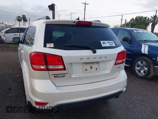 2016 Dodge Journey SXT with VIN 3C4PDCBG9GT167078, listed as a IAAI auction lot 41908052 with 204,994 mi miles. Bid and sale history available at carsss.com. Image 3.
