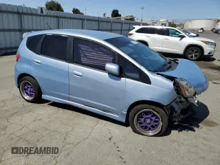2010 Honda Fit Sport with VIN JHMGE8H49AC011812, listed as a Copart auction lot 60341615 with 187,428 mi miles and Salvage title. Bid and sale history available at DreamBid. Image 4.