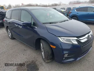 2020 Honda Odyssey EX-L with VIN 5FNRL6H70LB055122, listed as a IAAI auction lot 41620219 with 129,582 mi miles. Bid and sale history available at carsss.com. Image 1.