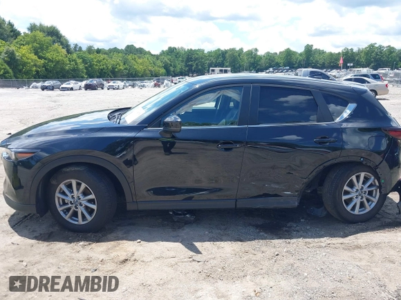 2023 Mazda CX-5 S Carbon Edition z VIN JM3KFBCMXP0201665, wystawiony jako IAAI lot #39965378 z przebiegiem 29 105 mil mil oraz . Historia ofert i sprzedaży dostępna na DreamBid. Obrazek 14.