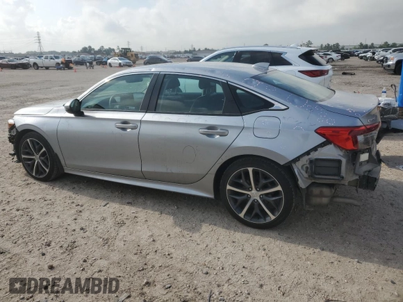 2023 Honda Civic Touring z VIN 2HGFE1F92PH323562, wystawiony jako Copart lot #54060205 z przebiegiem 20 504 mil mil oraz Czysty tytuł • Clean title. Historia ofert i sprzedaży dostępna na DreamBid. Obrazek 2.