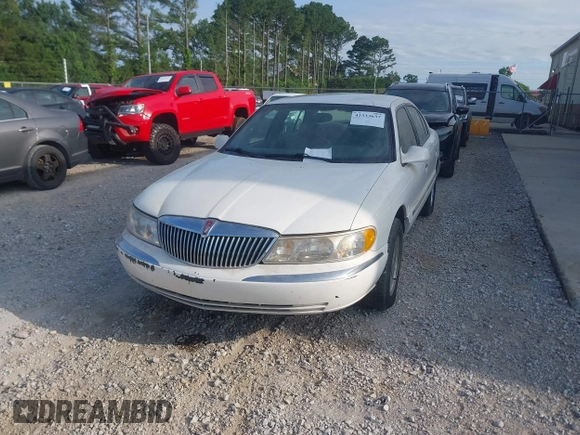 1998 Lincoln Continental z VIN 1LNLM97V1WY602564, wystawiony jako IAAI lot #42333637 z przebiegiem 142 234 mil mil oraz . Historia ofert i sprzedaży dostępna na DreamBid. Obrazek 6.