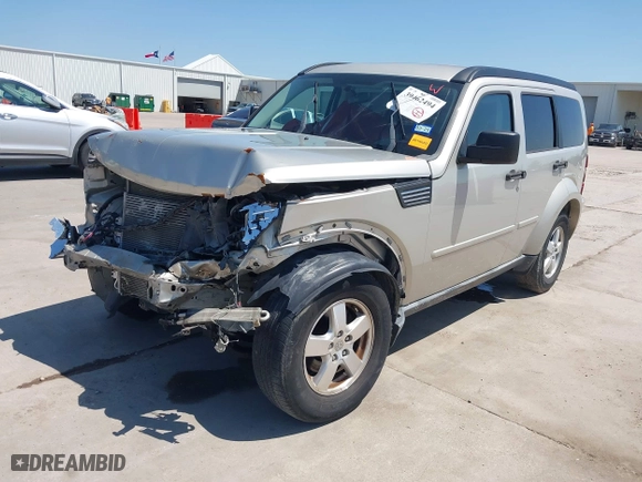 2009 Dodge Nitro SE with VIN 1D8GT28K99W513413, listed as a IAAI auction lot 39462494 with 196,456 mi miles. Bid and sale history available at carsss.com. Image 19.