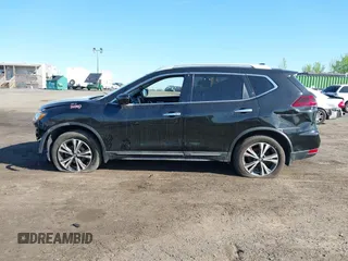2018 Nissan Rogue SV z VIN 5N1AT2MV2JC851483, wystawiony jako IAAI lot #42082917 z przebiegiem 115 707 mil mil oraz . Historia ofert i sprzedaży dostępna na DreamBid. Obrazek 14.