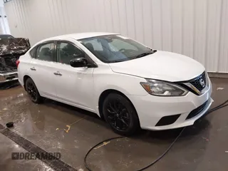 2018 Nissan Sentra S z VIN 3N1AB7AP6JY345661, wystawiony jako IAAI lot #42234612 z przebiegiem 63 393 mil mil oraz . Historia ofert i sprzedaży dostępna na DreamBid. Obrazek 1.