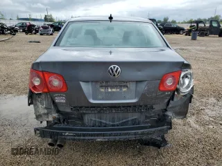 2007 Volkswagen Jetta 2.5 z VIN 3VWSF71K57M106657, wystawiony jako Copart lot #61479105 z przebiegiem 94 898 mil mil oraz Szkoda całkowita • Salvage title. Historia ofert i sprzedaży dostępna na DreamBid. Obrazek 6.