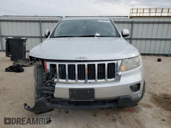 2011 Jeep Grand Cherokee 70th Anniversary with VIN 1J4RR4GT0BC666579, listed as a Copart auction lot 87322784 with 163,439 mi miles and Salvage Title. Bid and sale history available at carsss.com. Image 5.